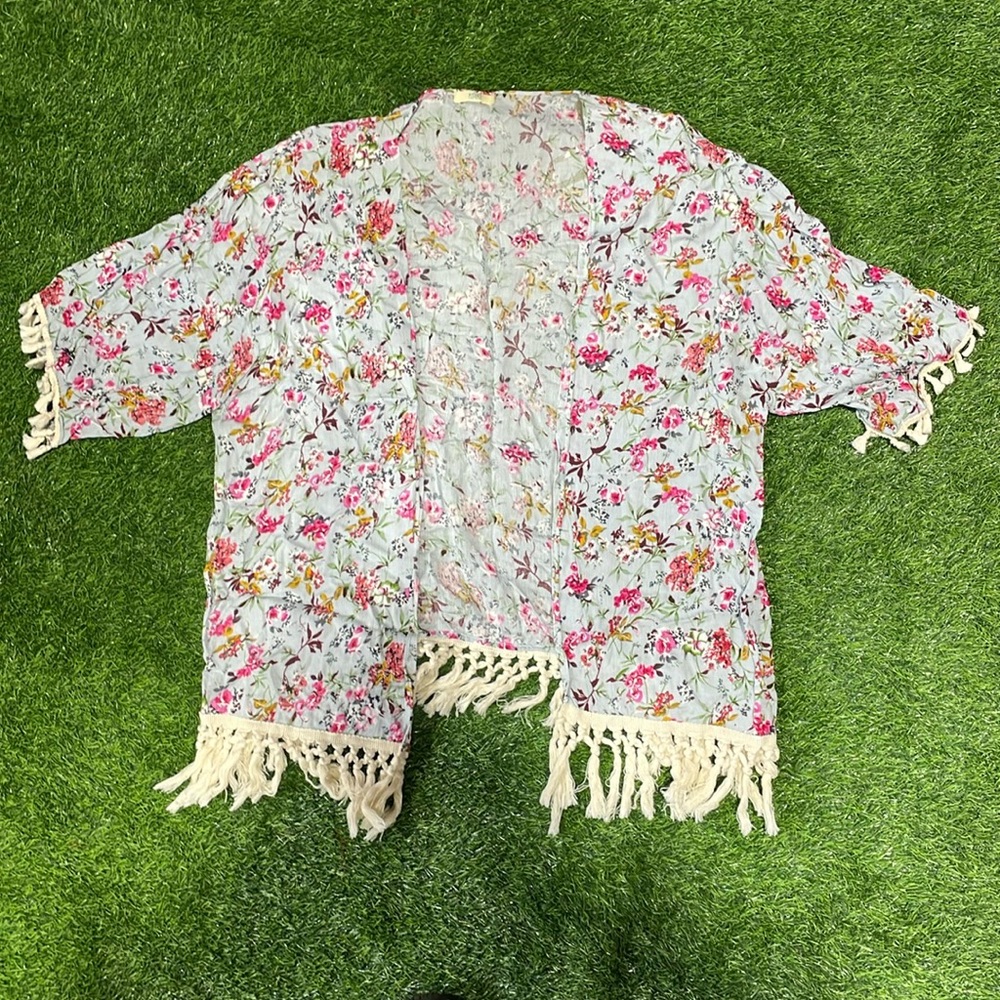 Ladies floral tunic with cream cotton fringe.